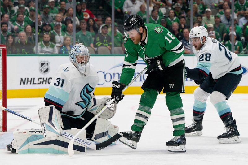 May 15, 2023; Dallas, Texas, USA; Dallas Stars center Joe Pavelski (16) attempts to redirect the puck past Seattle Kraken goaltender Philipp Grubauer (31) during the second period in game seven of the second round of the 2023 Stanley Cup Playoffs at the American Airlines Center. Mandatory Credit: Jerome Miron-USA TODAY Sports