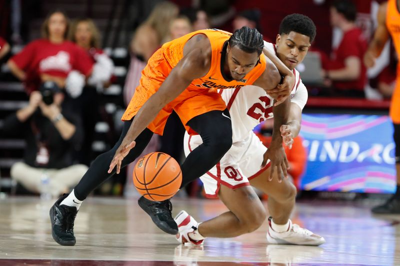 Feb 1, 2023; Norman, Oklahoma, USA; Oklahoma State Cowboys guard John-Michael Wright (51) and Oklahoma Sooners guard Grant Sherfield (25) reach for a loose ball during the second half at Lloyd Noble Center. Mandatory Credit: Alonzo Adams-USA TODAY Sports