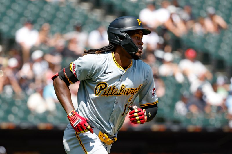 Jul 14, 2024; Chicago, Illinois, USA; Pittsburgh Pirates shortstop Oneil Cruz (15) runs after hitting an RBI-double against the Chicago White Sox during the third inning at Guaranteed Rate Field. Mandatory Credit: Kamil Krzaczynski-USA TODAY Sports