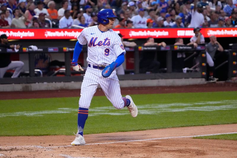 Jul 2, 2023; New York City, New York, USA; New York Mets center fielder Brandon Nimmo (9) scores a run on New York Mets second baseman Jeff McNeil (not pictured) RBI infield single against the San Francisco Gianes during the third inning at Citi Field. Mandatory Credit: Gregory Fisher-USA TODAY Sports