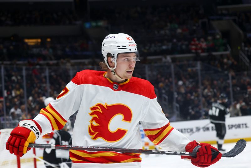 Dec 23, 2023; Los Angeles, California, USA; Calgary Flames center Connor Zary (47) looks on during the third period of a game against the Los Angeles Kings at Crypto.com Arena. Mandatory Credit: Jessica Alcheh-USA TODAY Sports