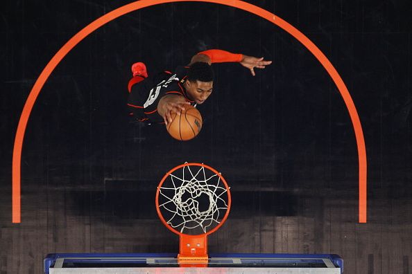 DETROIT, MI - DECEMBER 26:  Jaden Ivey #23 of the Detroit Pistons drives to the basket during the game against the Brooklyn Nets on December 26, 2023 at Little Caesars Arena in Detroit, Michigan. NOTE TO USER: User expressly acknowledges and agrees that, by downloading and/or using this photograph, User is consenting to the terms and conditions of the Getty Images License Agreement. Mandatory Copyright Notice: Copyright 2023 NBAE (Photo by Brian Sevald/NBAE via Getty Images)