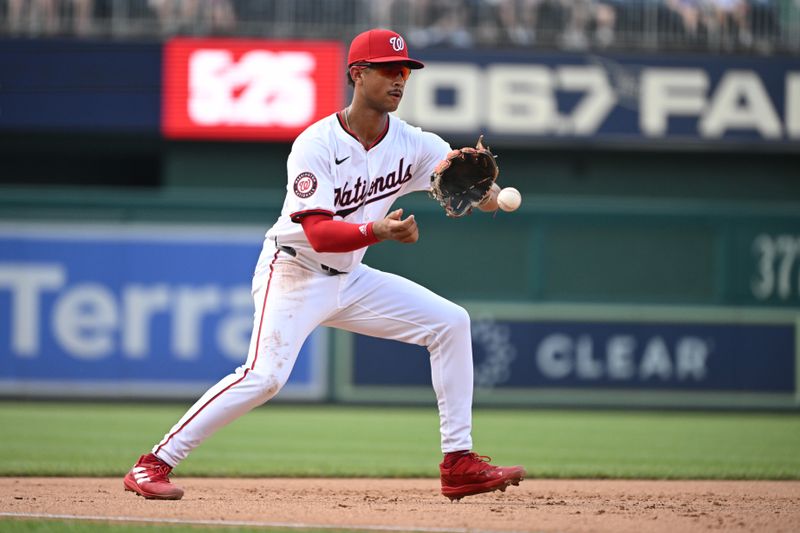 Jul 8, 2024; Washington, District of Columbia, USA; Washington Nationals third baseman Trey Lipscomb (38) fields a ground ball against the St. Louis Cardinals during the sixth inning at Nationals Park. Mandatory Credit: Rafael Suanes-USA TODAY Sports