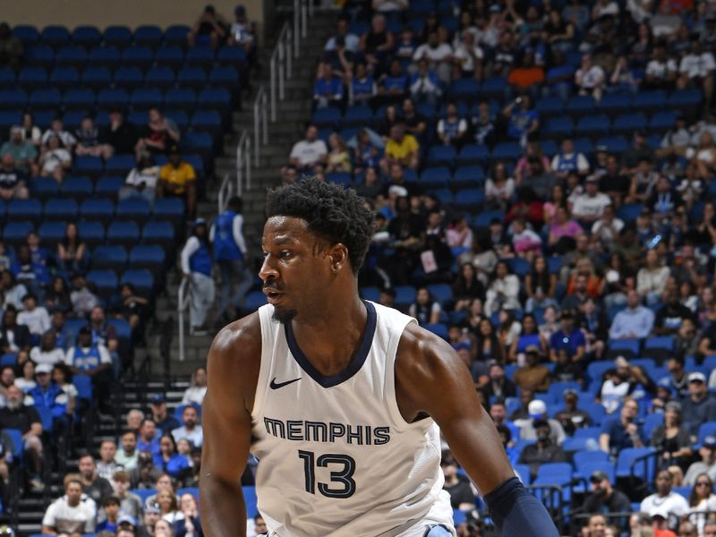 ORLANDO, FL - MARCH 30: Jaren Jackson Jr. #13 of the Memphis Grizzlies dribbles the ball during the game against the Orlando Magic on March 30, 2024 at the Kia Center in Orlando, Florida. NOTE TO USER: User expressly acknowledges and agrees that, by downloading and or using this photograph, User is consenting to the terms and conditions of the Getty Images License Agreement. Mandatory Copyright Notice: Copyright 2024 NBAE (Photo by Fernando Medina/NBAE via Getty Images)