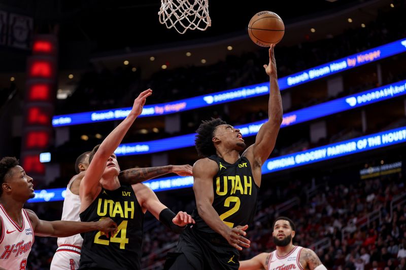 HOUSTON, TEXAS - JANUARY 20: Collin Sexton #2 of the Utah Jazz goes up for a lay up in the second half against the Houston Rockets at Toyota Center on January 20, 2024 in Houston, Texas.  NOTE TO USER: User expressly acknowledges and agrees that, by downloading and or using this photograph, User is consenting to the terms and conditions of the Getty Images License Agreement. (Photo by Tim Warner/Getty Images)