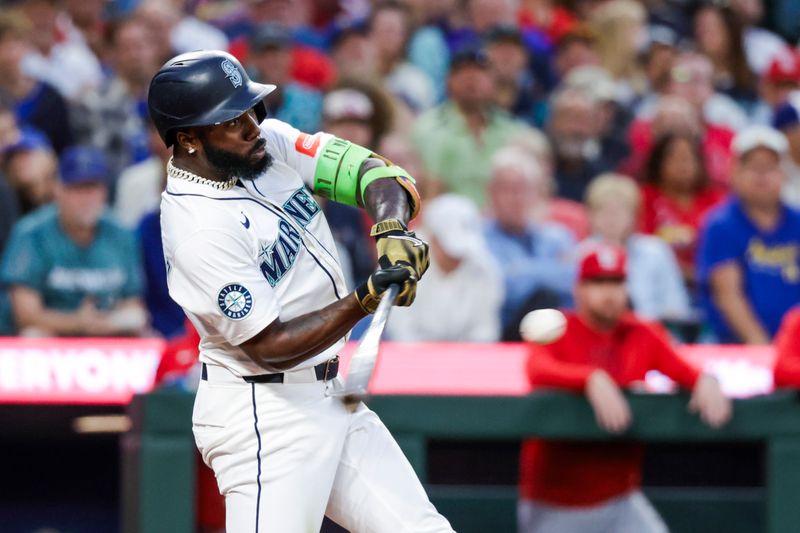 Sep 9, 2025; Seattle, Washington, USA; Seattle Mariners left fielder Randy Arozarena (56) hits a three-run home run against the St. Louis Cardinals during the third inning at T-Mobile Park. Mandatory Credit: Joe Nicholson-Imagn Images