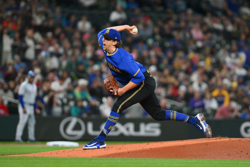 Sep 14, 2024; Seattle, Washington, USA; Seattle Mariners starting pitcher Logan Gilbert (36) pitches to the Texas Rangers during the first inning at T-Mobile Park. Mandatory Credit: Steven Bisig-Imagn Images