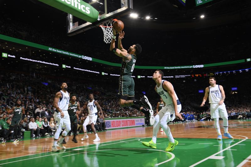 BOSTON, MA - NOVEMBER 23: Jayson Tatum #0 of the Boston Celtics drives to the basket during the game against the Dallas Mavericks on November 23, 2022 at the TD Garden in Boston, Massachusetts.  NOTE TO USER: User expressly acknowledges and agrees that, by downloading and or using this photograph, User is consenting to the terms and conditions of the Getty Images License Agreement. Mandatory Copyright Notice: Copyright 2022 NBAE  (Photo by Brian Babineau/NBAE via Getty Images)