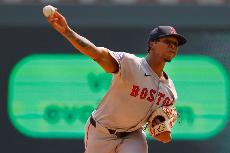 Jul 30, 2025; Minneapolis, Minnesota, USA; Boston Red Sox starting pitcher Brayan Bello (66) throws to the Minnesota Twins in the first inning at Target Field. Mandatory Credit: Bruce Kluckhohn-Imagn Images