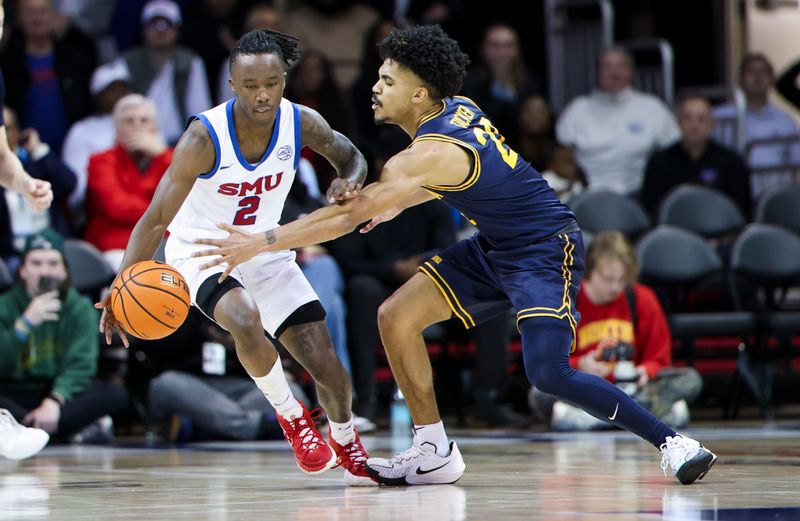 Jan 29, 2025; Dallas, Texas, USA;  Southern Methodist Mustangs guard Boopie Miller (2) and California Golden Bears guard Christian Tucker (22) go for the ball during the second half at Moody Coliseum. Mandatory Credit: Kevin Jairaj-Imagn Images