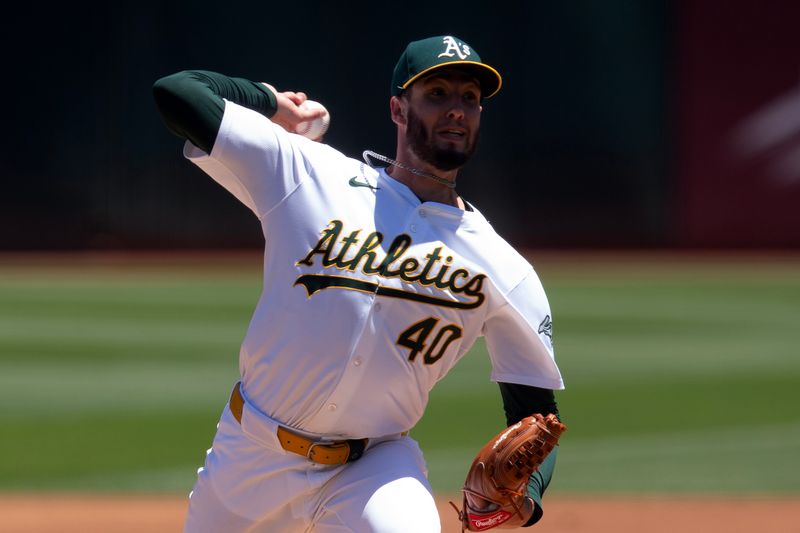 Jul 7, 2024; Oakland, California, USA; Oakland Athletics starting pitcher Mitch Spence (40) delivers a pitch against the Baltimore Orioles during the first inning at Oakland-Alameda County Coliseum. Mandatory Credit: D. Ross Cameron-USA TODAY Sports