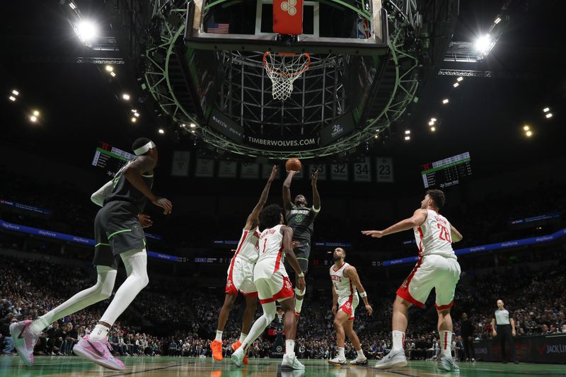 MINNEAPOLIS, MN -  NOVEMBER 26: Anthony Edwards #5 of the Minnesota Timberwolves drives to the basket during the game against the Houston Rockets during the Emirates NBA Cup game on November 26, 2024 at Target Center in Minneapolis, Minnesota. NOTE TO USER: User expressly acknowledges and agrees that, by downloading and or using this Photograph, user is consenting to the terms and conditions of the Getty Images License Agreement. Mandatory Copyright Notice: Copyright 2024 NBAE (Photo by Jordan Johnson/NBAE via Getty Images)