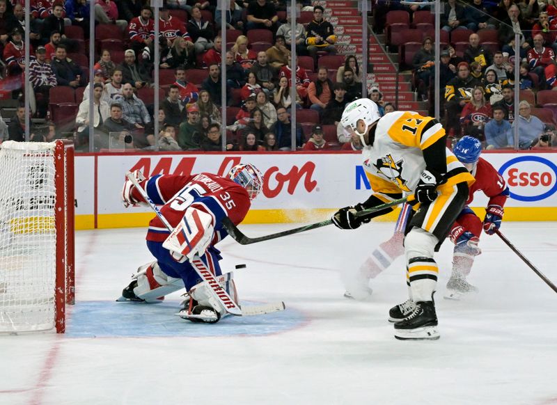 Oct 14, 2024; Montreal, Quebec, CAN; Montreal Canadiens goalie Sam Montembeault (35) stops Pittsburgh Penguins forward Bryan Rust (17) during the third period at the Bell Centre. Mandatory Credit: Eric Bolte-Imagn Images