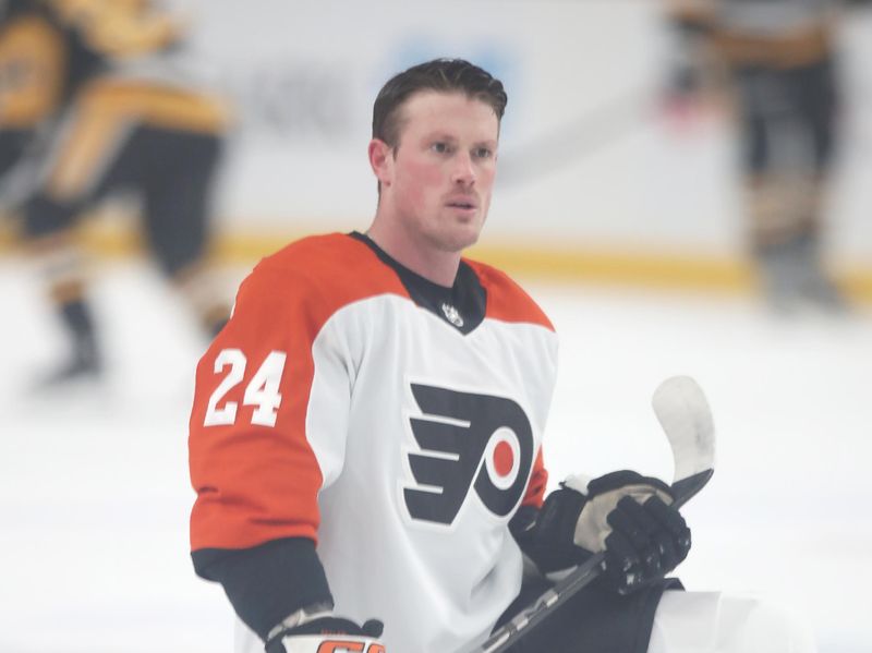 Feb 27, 2025; Pittsburgh, Pennsylvania, USA;  Philadelphia Flyers defenseman Nick Seeler (24) warms up against the Pittsburgh Penguins at PPG Paints Arena. Mandatory Credit: Charles LeClaire-Imagn Images