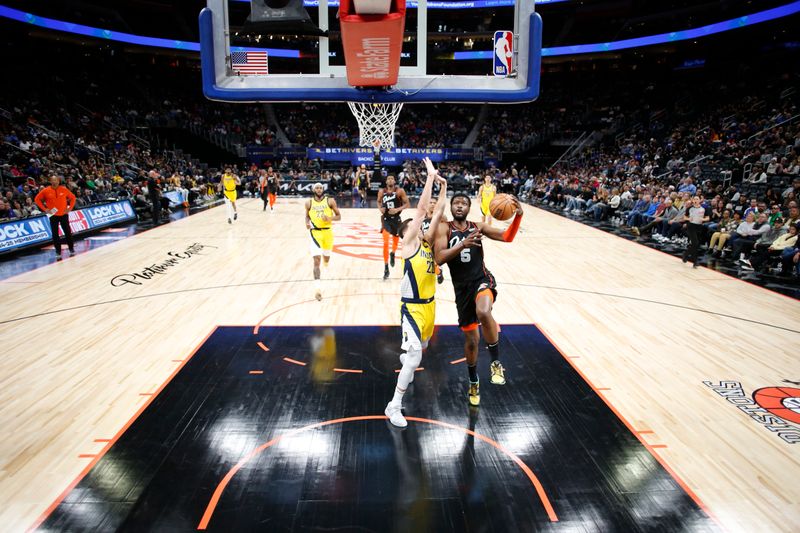 DETROIT, MI - MARCH 20: Shake Milton #5 of the Detroit Pistons drives to the basket during the game against the Indiana Pacers on March 20, 2024 at Little Caesars Arena in Detroit, Michigan. NOTE TO USER: User expressly acknowledges and agrees that, by downloading and/or using this photograph, User is consenting to the terms and conditions of the Getty Images License Agreement. Mandatory Copyright Notice: Copyright 2024 NBAE (Photo by Brian Sevald/NBAE via Getty Images)