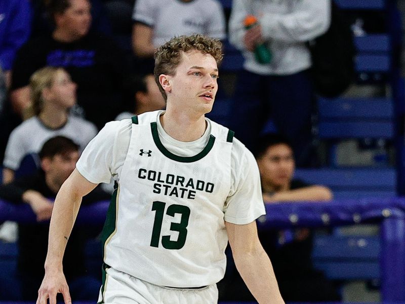 Feb 25, 2025; Colorado Springs, Colorado, USA; Colorado State Rams guard Bowen Born (13) dribbles the ball up court in the first half against the Air Force Falcons at Clune Arena. Mandatory Credit: Isaiah J. Downing-Imagn Images