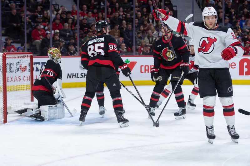 Dec 29, 2023; Ottawa, Ontario, CAN; New Jersey Devils center Dawson Mercer (91) celebrates his goal scored against Ottawa Senators goalie Joonas Korpisalo (70) in the second period at the Canadian Tire Centre. Mandatory Credit: Marc DesRosiers-USA TODAY Sports