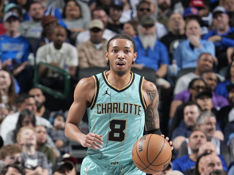 DALLAS, TX - FEBRUARY 27: Nick Smith Jr. #8 of the Charlotte Hornets brings the ball up court during the game against the Dallas Mavericks on February 27, 2025 at American Airlines Center in Dallas, Texas. NOTE TO USER: User expressly acknowledges and agrees that, by downloading and or using this photograph, User is consenting to the terms and conditions of the Getty Images License Agreement. Mandatory Copyright Notice: Copyright 2025 NBAE(Photo by Glenn James/NBAE via Getty Images)