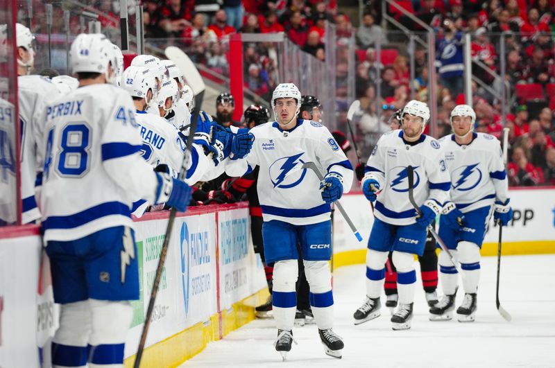 Mar 11, 2025; Raleigh, North Carolina, USA;  Tampa Bay Lightning center Gage Goncalves (93) celebrates his goal against the Carolina Hurricanes during the third period at Lenovo Center. Mandatory Credit: James Guillory-Imagn Images