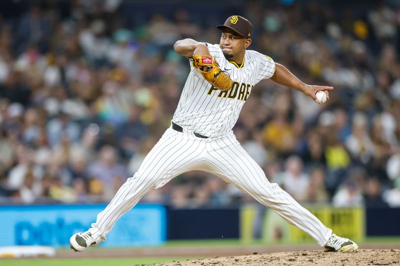 May 31, 2025; San Diego, California, USA; San Diego Padres relief pitcher Wandy Peralta (58) throws a pitch during the ninth inning against the Pittsburgh Pirates at Petco Park. Mandatory Credit: David Frerker-Imagn Images