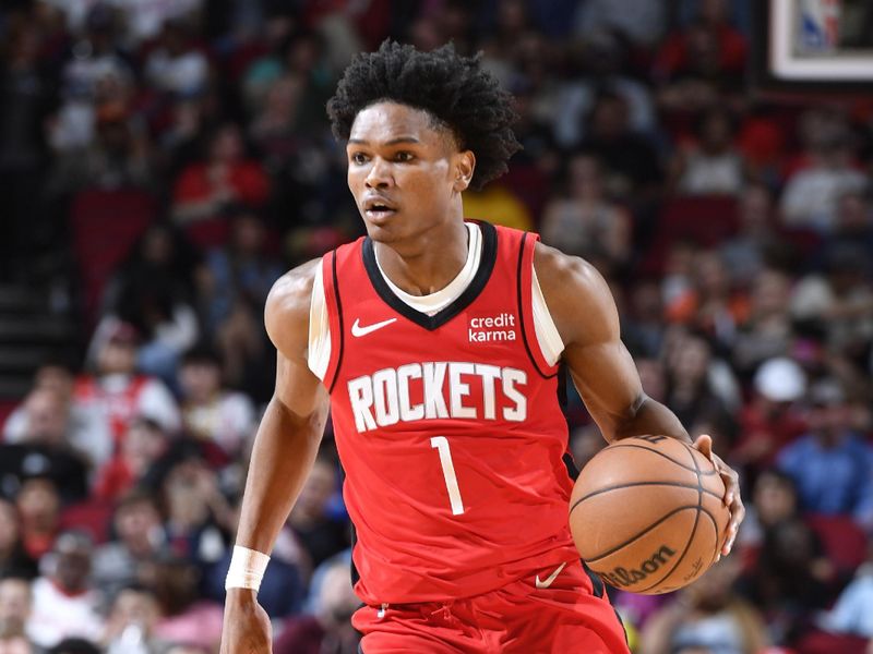 HOUSTON, TX - MARCH 25: Amen Thompson #1 of the Houston Rockets handles the ball during the game against the Portland Trail Blazers on March 25, 2024 at the Toyota Center in Houston, Texas. NOTE TO USER: User expressly acknowledges and agrees that, by downloading and or using this photograph, User is consenting to the terms and conditions of the Getty Images License Agreement. Mandatory Copyright Notice: Copyright 2024 NBAE (Photo by Logan Riely/NBAE via Getty Images)