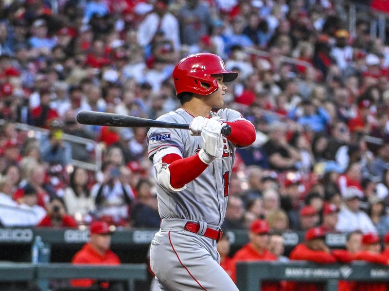 May 3, 2023; St. Louis, Missouri, USA;  Los Angeles Angels starting pitcher Shohei Ohtani (17) hits a one run single against the St. Louis Cardinals during the third inning at Busch Stadium. Mandatory Credit: Jeff Curry-USA TODAY Sports