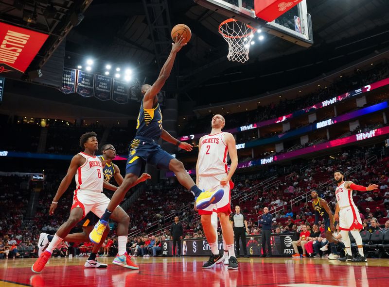 HOUSTON, TEXAS - OCTOBER 10: Aaron Nesmith #23 of the Indiana Pacers attempts a layup during the second quarter of the preseason game against the Houston Rockets at Toyota Center on October 10, 2023 in Houston, Texas. NOTE TO USER: User expressly acknowledges and agrees that, by downloading and or using this photograph, User is consenting to the terms and conditions of the Getty Images License Agreement. (Photo by Alex Bierens de Haan/Getty Images)