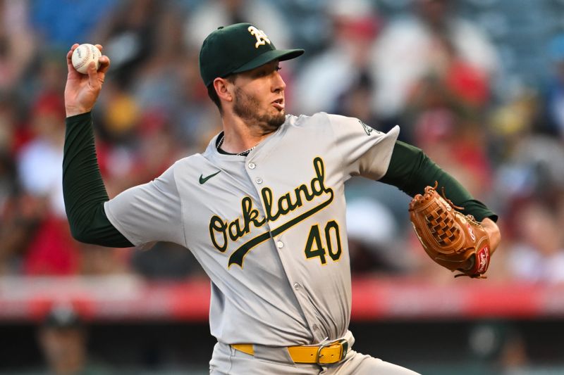 Jul 27, 2024; Anaheim, California, USA; Oakland Athletics pitcher Mitch Spence (40) throws a pitch against the Los Angeles Angels during the second inning at Angel Stadium. Mandatory Credit: Jonathan Hui-USA TODAY Sports