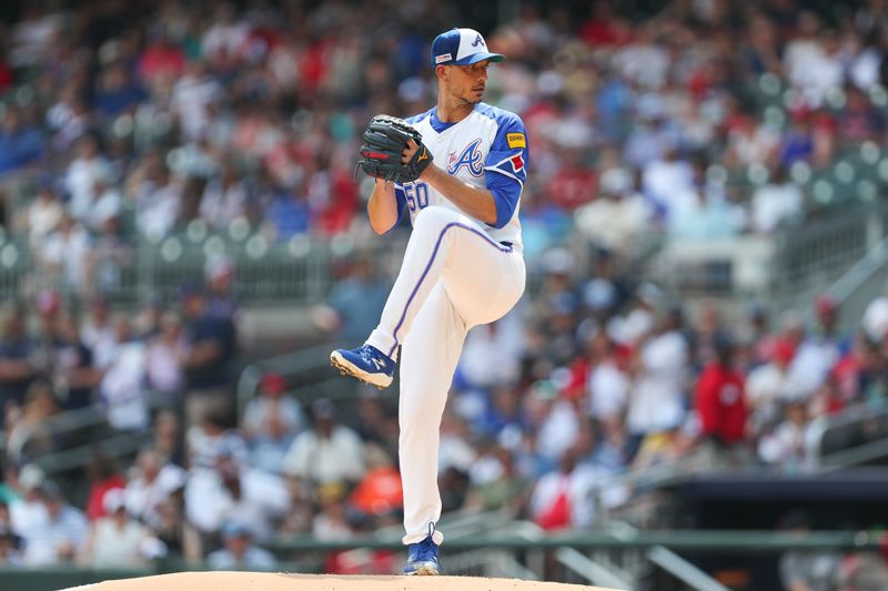 Jun 15, 2024; Cumberland, Georgia, USA;  Atlanta Braves starting pitcher Charlie Morton (50) pitches against the Tampa Bay Rays during the first inning at Truist Park. Mandatory Credit: Mady Mertens-USA TODAY Sports