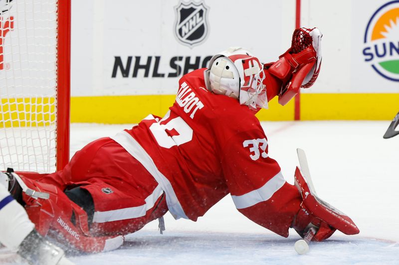 Oct 3, 2024; Detroit, Michigan, USA;  Detroit Red Wings goaltender Cam Talbot (39) makes a save in the first period against the Toronto Maple Leafs at Little Caesars Arena. Mandatory Credit: Rick Osentoski-Imagn Images