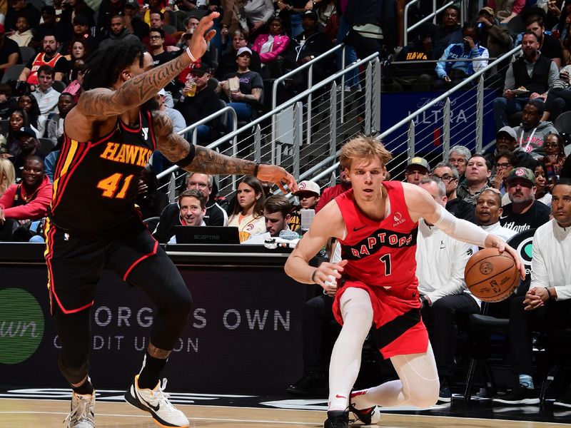 ATLANTA, GA - February 23:  Gradey Dick #1 of the Toronto Raptors handles the ball during the game against the Atlanta Hawks on February 23, 2024 at State Farm Arena in Atlanta, Georgia.  NOTE TO USER: User expressly acknowledges and agrees that, by downloading and/or using this Photograph, user is consenting to the terms and conditions of the Getty Images License Agreement. Mandatory Copyright Notice: Copyright 2024 NBAE (Photo by Scott Cunningham/NBAE via Getty Images)