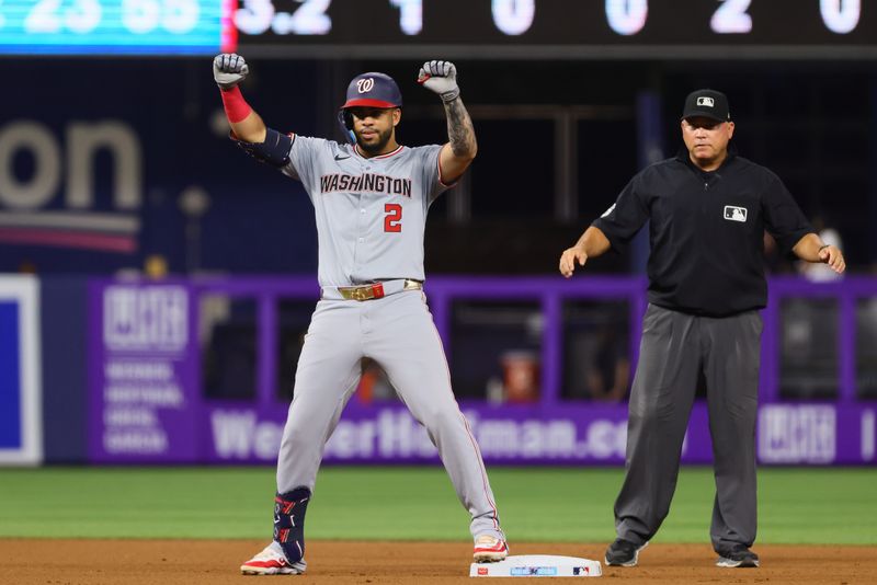 Sep 4, 2024; Miami, Florida, USA; Washington Nationals second baseman Luis Garcia Jr. (2) reacts from second base after hitting a double against the Miami Marlins during the fourth inning at loanDepot Park. Mandatory Credit: Sam Navarro-Imagn Images