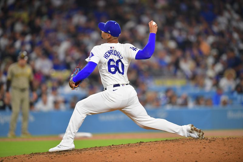 Sep 24, 2024; Los Angeles, California, USA; Los Angeles Dodgers pitcher Edgardo Henriquez (60) throws against the San Diego Padres during the sixth inning in his major league debut at Dodger Stadium. Mandatory Credit: Gary A. Vasquez-Imagn Images