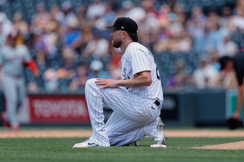 Jun 23, 2024; Denver, Colorado, USA; Colorado Rockies starting pitcher Kyle Freeland (21) reacts after a play in the sixth inning against the Washington Nationals at Coors Field. Mandatory Credit: Isaiah J. Downing-USA TODAY Sports