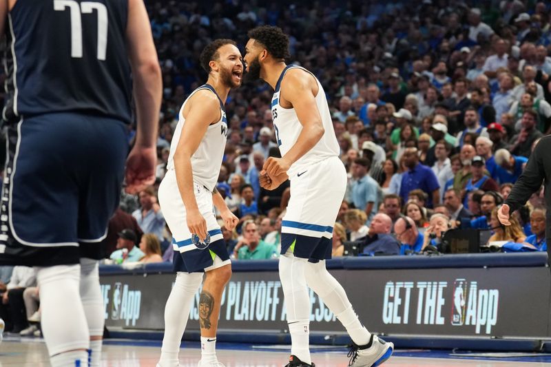 DALLAS, TX - MAY 28:  Kyle Anderson #1 and Karl-Anthony Towns #32 of the Minnesota Timberwolves celebrates during the game against the Dallas Mavericks during Game 3 of the Western Conference Finals of the 2024 NBA Playoffs on May 28, 2024 at the American Airlines Center in Dallas, Texas. NOTE TO USER: User expressly acknowledges and agrees that, by downloading and or using this photograph, User is consenting to the terms and conditions of the Getty Images License Agreement. Mandatory Copyright Notice: Copyright 2024 NBAE (Photo by Jesse D. Garrabrant/NBAE via Getty Images)