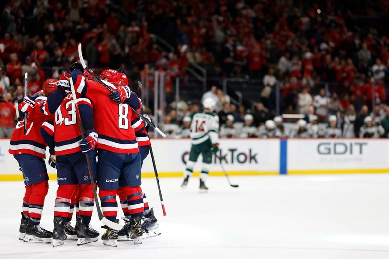 Oct 17, 2025; Washington, District of Columbia, USA; Washington Capitals right wing Tom Wilson (43) celebrates with teammates after scoring a goal against the Minnesota Wild during the third period at Capital One Arena. Mandatory Credit: Geoff Burke-Imagn Images