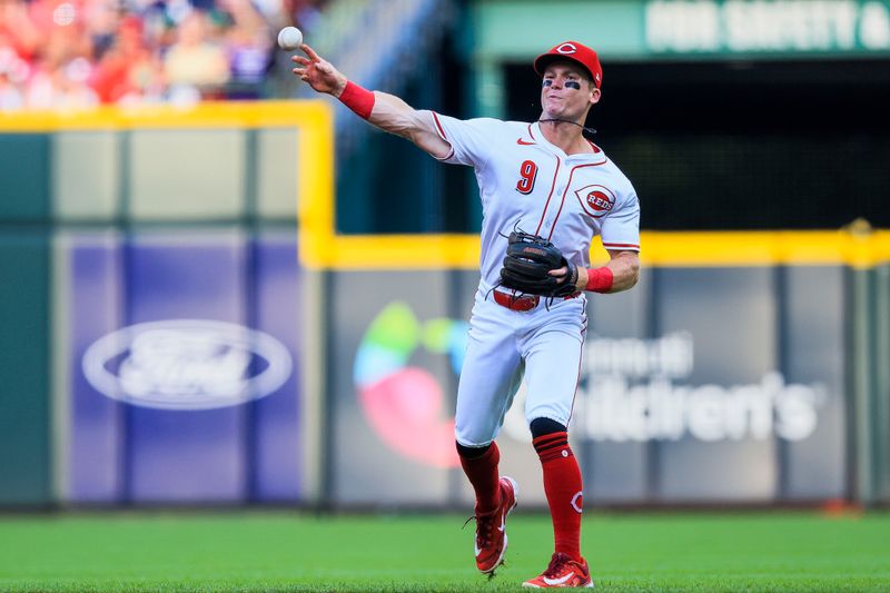 Jun 24, 2025; Cincinnati, Ohio, USA; Cincinnati Reds second baseman Matt McLain (9) throws to first to get New York Yankees catcher Austin Wells (not pictured) out in the third inning at Great American Ball Park. Mandatory Credit: Katie Stratman-Imagn Images