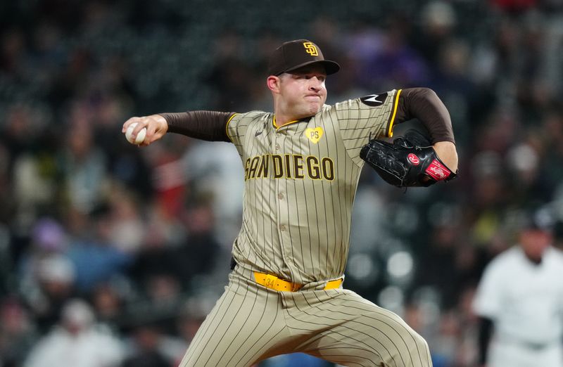 Apr 23, 2024; Denver, Colorado, USA; San Diego Padres starting pitcher Michael King (34) delivers a pitch in the fourth inning against the Colorado Rockies at Coors Field. Mandatory Credit: Ron Chenoy-USA TODAY Sports