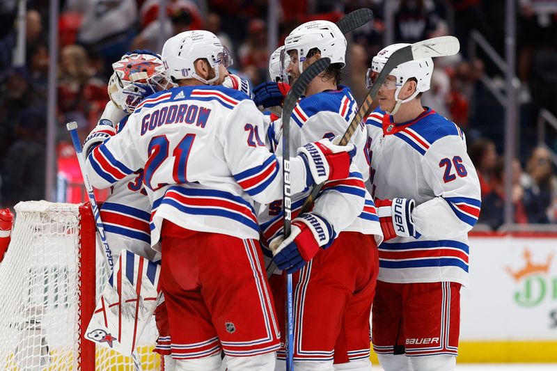 Apr 28, 2024; Washington, District of Columbia, USA; New York Rangers goaltender Igor Shesterkin (31) celebrates with teammates after their game against the Washington Capitals in game four of the first round of the 2024 Stanley Cup Playoffs at Capital One Arena. Mandatory Credit: Geoff Burke-USA TODAY Sports