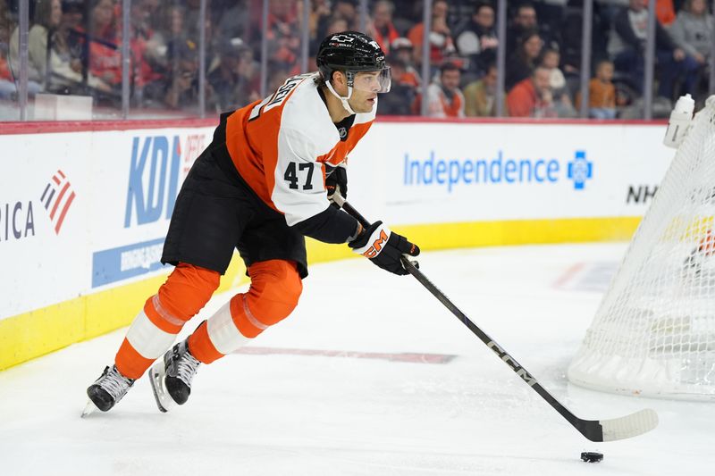 Oct 25, 2025; Philadelphia, Pennsylvania, USA; Philadelphia Flyers defenseman Noah Juulsen (47) controls the puck against the New York Islanders in the first period at Xfinity Mobile Arena. Mandatory Credit: Kyle Ross-Imagn Images