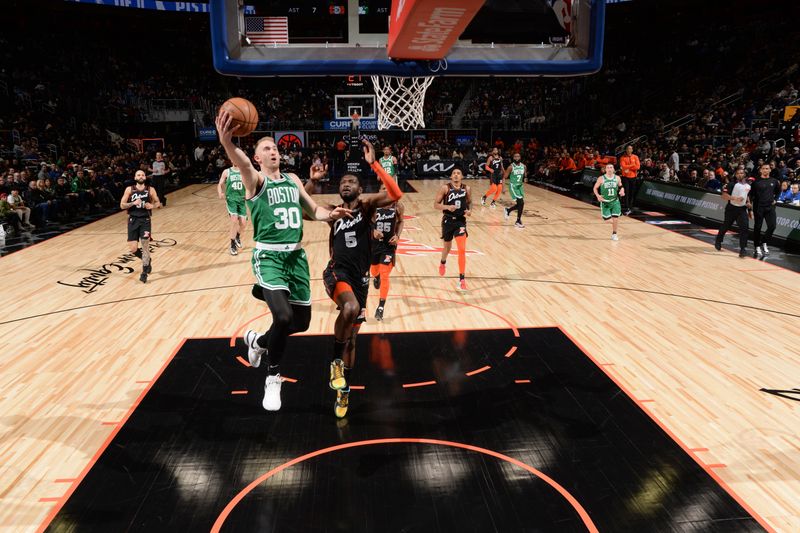 DETROIT, MI - MARCH 22: Sam Hauser #30 of the Boston Celtics drives to the basket during the game against the Detroit Pistons on March 22, 2024 at Little Caesars Arena in Detroit, Michigan. NOTE TO USER: User expressly acknowledges and agrees that, by downloading and/or using this photograph, User is consenting to the terms and conditions of the Getty Images License Agreement. Mandatory Copyright Notice: Copyright 2024 NBAE (Photo by Chris Schwegler/NBAE via Getty Images)