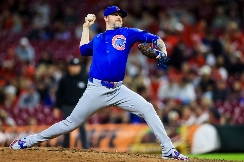May 23, 2025; Cincinnati, Ohio, USA; Chicago Cubs relief pitcher Ryan Pressly (55) pitches against the Cincinnati Reds in the ninth inning at Great American Ball Park. Mandatory Credit: Katie Stratman-Imagn Images