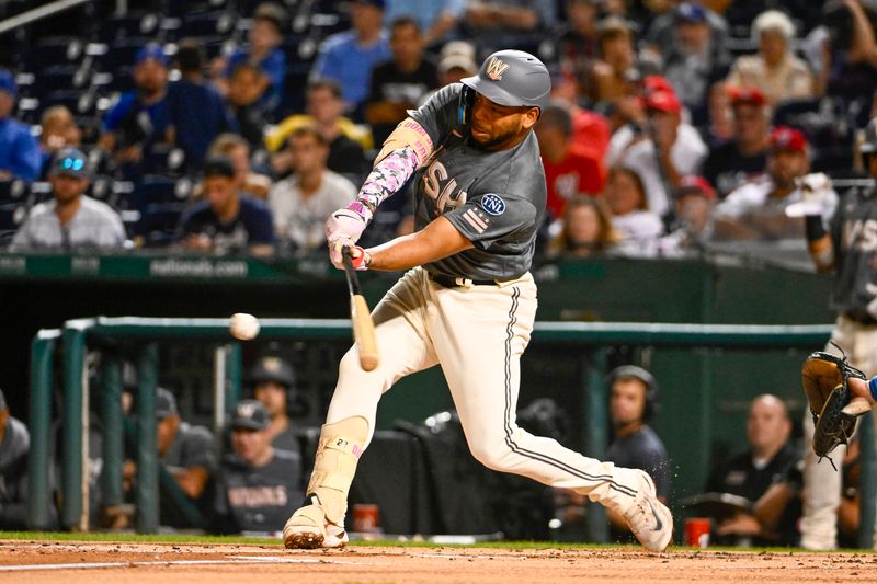 Sep 9, 2023; Washington, District of Columbia, USA; Washington Nationals first baseman Dominic Smith (22) singles against the Los Angeles Dodgers during the first inning at Nationals Park. Mandatory Credit: Brad Mills-USA TODAY Sports