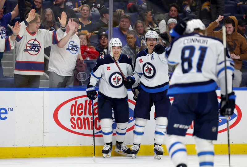 Mar 3, 2024; Buffalo, New York, USA;  Winnipeg Jets center Vladislav Namestnikov (7) celebrates his goal with teammates during the third period against the Buffalo Sabres at KeyBank Center. Mandatory Credit: Timothy T. Ludwig-USA TODAY Sports