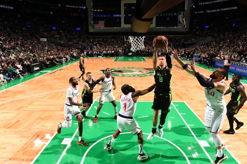 BOSTON, MA - NOVEMBER 25:  Kristaps Porzingis #8 of the Boston Celtics drives to the basket during the game against the LA Clippers on November 25, 2024 at TD Garden in Boston, Massachusetts. NOTE TO USER: User expressly acknowledges and agrees that, by downloading and/or using this Photograph, user is consenting to the terms and conditions of the Getty Images License Agreement. Mandatory Copyright Notice: Copyright 2024 NBAE (Photo by Brian Babineau/NBAE via Getty Images)