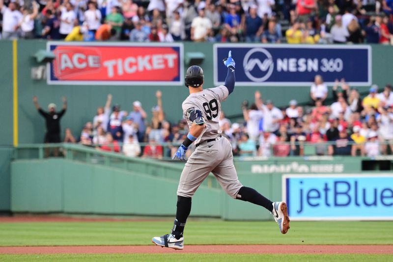 Jun 16, 2024; Boston, Massachusetts, USA; New York Yankees center fielder Aaron Judge (99) reacts to hitting a home run against the Boston Red Sox during the first inning at Fenway Park. Mandatory Credit: Eric Canha-USA TODAY Sports