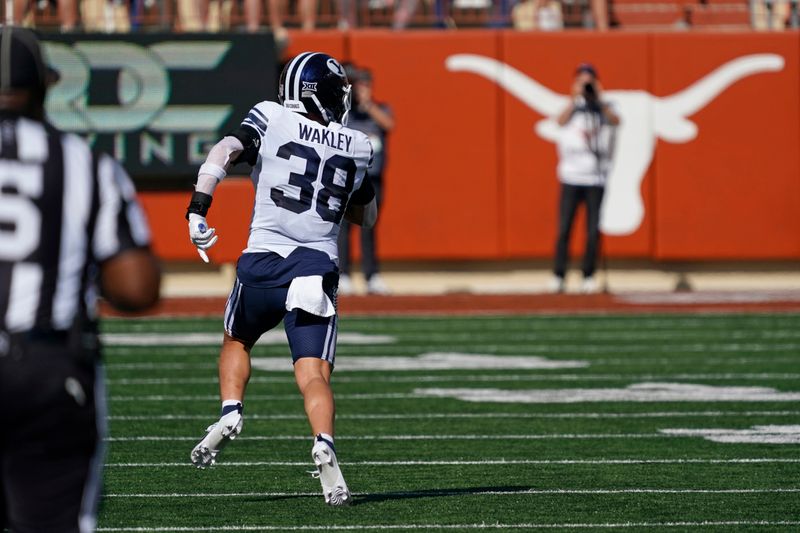 Oct 28, 2023; Austin, Texas, USA; Brigham Young Cougars (38) runs toward the end zone after making an interception against the Texas Longhorns during the first half at Darrell K Royal-Texas Memorial Stadium. Mandatory Credit: Scott Wachter-USA TODAY Sports