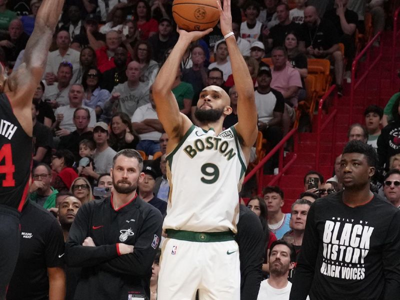 MIAMI, FL - FEBRUARY 11: Derrick White #9 of the Boston Celtics shoots the ball during the game against the Miami Heat on February 11, 2024 at Kaseya Center in Miami, Florida. NOTE TO USER: User expressly acknowledges and agrees that, by downloading and or using this Photograph, user is consenting to the terms and conditions of the Getty Images License Agreement. Mandatory Copyright Notice: Copyright 2024 NBAE (Photo by Eric Espada/NBAE via Getty Images)