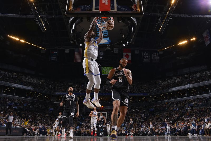 BROOKLYN, NY - MARCH 6:Jimmy Butler #10 of the Golden State Warriors dunks the ball during the game against the Brooklyn Nets  on March 6, 2025 at Barclays Center in Brooklyn, New York. NOTE TO USER: User expressly acknowledges and agrees that, by downloading and or using this Photograph, user is consenting to the terms and conditions of the Getty Images License Agreement. Mandatory Copyright Notice: Copyright 2025 NBAE (Photo by Jesse D. Garrabrant/NBAE via Getty Images)