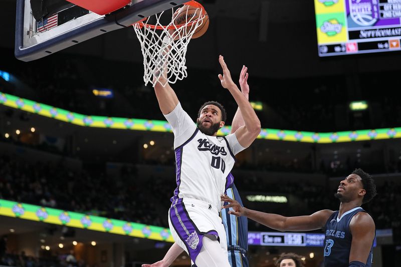 MEMPHIS, TENNESSEE - JANUARY 29: JaVale McGee #00 of the Sacramento Kings goes to the basket during the first half against the Memphis Grizzlies at FedExForum on January 29, 2024 in Memphis, Tennessee. NOTE TO USER: User expressly acknowledges and agrees that, by downloading and or using this photograph, User is consenting to the terms and conditions of the Getty Images License Agreement. (Photo by Justin Ford/Getty Images)